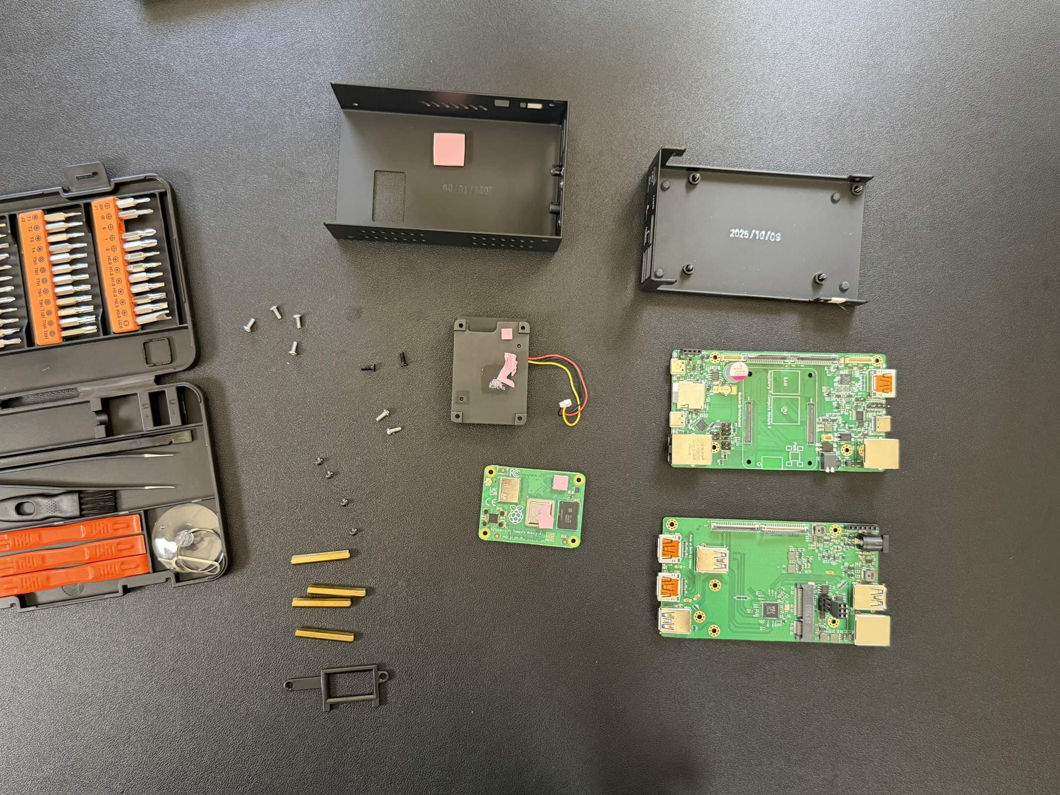 An IP KVM stripped to its boards, the state every chip identification starts from.