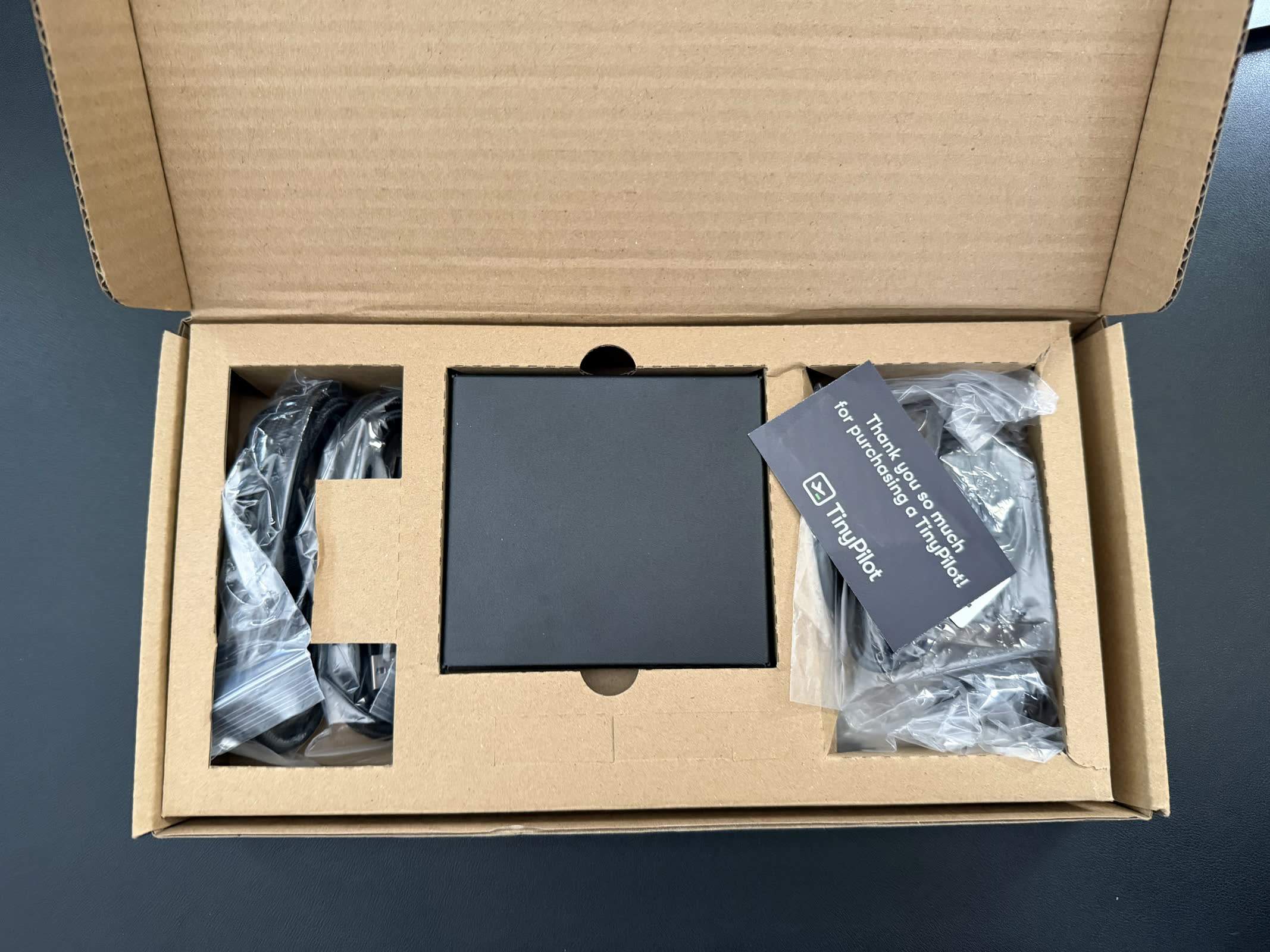 Flat-lay of the Voyager 3 packaging and branded accessories, the best-presented unboxing on our bench.