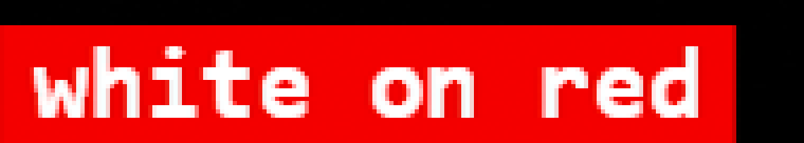 The same white-on-red text badge captured in full color mode, with clean white letter edges and no color fringing